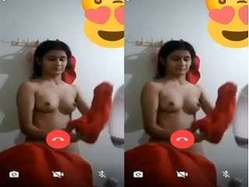 A stunning woman flaunts her breasts and intimate area in a video chat