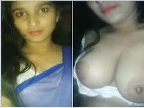 Beautiful girl fondling her breasts in sensual video