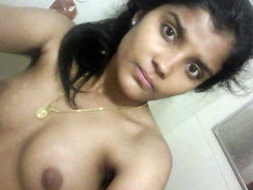 A young woman uses her phone for self-stimulation