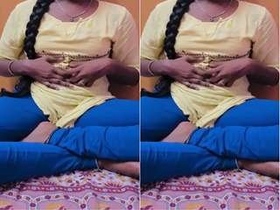 Tamil girl flaunts her breasts and pussy in a seductive video