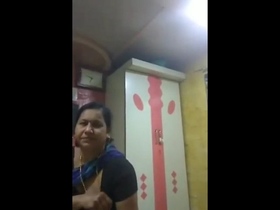 Indian aunt performs a sensual oral sex act on her spouse