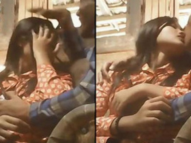 Couple shares intimate moments in a restaurant
