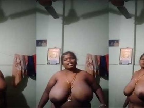 A South Indian wife flaunts her big, natural breasts in a steamy video