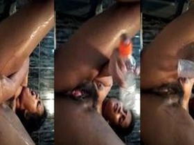 Horny bitch gets her pussy fucked with a bottle in MMS video