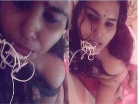 Intimate video of a sexy single girl revealing her breasts