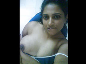Indian wife Parvati displays her pregnant belly and milk-filled breasts in a video