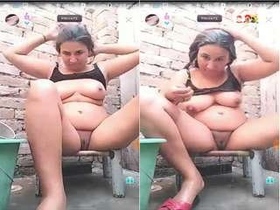 Pakistani auntie takes a bath in public