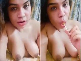Horny girl flaunts her big boobs in steamy video
