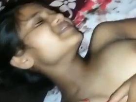 A young woman from Guwahati enjoys a passionate encounter with her lover, who skillfully explores her shaved and eager pussy, while she reciprocates with sweet moans of pleasure.