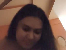 A seductive Indian woman experiences pleasure by straddling a penis.