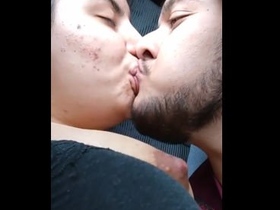 Indian lovers share a passionate kiss in a steamy video