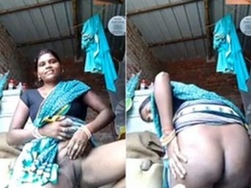 Experience the eroticism of a Desi auntie talking in this village video