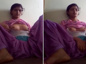 Horny Indian teen masturbates in purple outfit