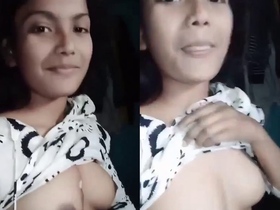 Busty college girl bares her small boobs for the camera