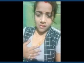 Aroused wife reveals her intimate area and has an attractive face