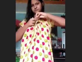 A Bengali woman pleasures herself with her fingers on her unshaved and moist genitals