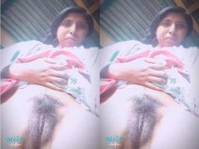 Nepali girl's pussy gets pleasured in hot video