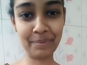 Desi woman unhooks bra for solo selfies