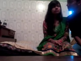 Hidden young Indian couple in a steamy video