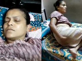 Indian homemaker indulges in self-pleasure by licking, fingering, and squeezing her breasts