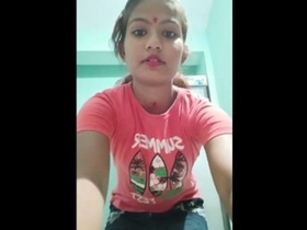 An attractive Indian college woman misbehaves for the camera