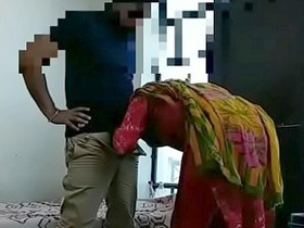 A South Asian woman takes pleasure in performing oral sex on her generously endowed lover