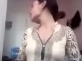 Country girl flaunts her breasts in front of camera