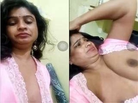 Telugu bhabhi flaunts her big tits in a steamy video