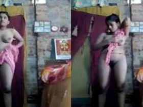 Desi girl dries off body with a towel, revealing erogenous zones on camera