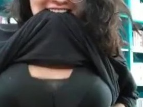 Watch a Tamil woman with massive breasts in this online video