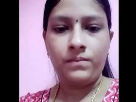 Indian village woman reveals her large breasts