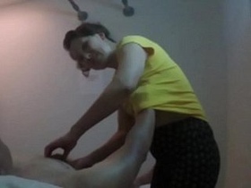 Watch as a professional massage therapist gives a sensual massage to a client