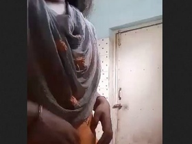 Village bhabi from India displays her large breasts