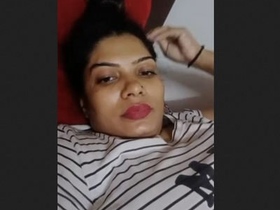 Seductive Indian woman flaunts her large breasts