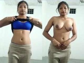 Exclusive video of a hot Indian babe exposing her breasts and pussy