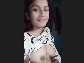 Adorable college coed flaunts petite breasts