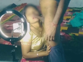 A charming Indian wife engages in intimate activities during the middle of the night