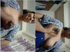 Wife's big tits get some attention from her husband