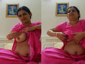 Punjabi bhabhi in pink salwar kameez takes a sexy selfie and moans
