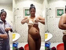 Hot Desi gets naked and dressed up for a XXX camera