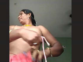 Hidden camera captures bhabhi's hidden tits in steamy session