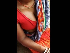 Village lady with large breasts and exposed cleavage