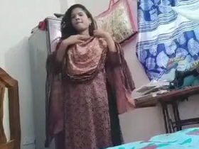 A cute Indian girl reveals her body on camera from a village background