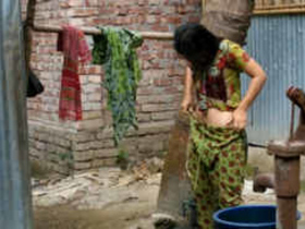 Hidden camera captures a Desi Indian girl's bath and clothing change