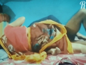 A village woman engages in intimate activities during the middle of the night