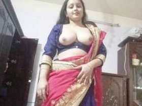Cute Indian boudi flaunts her tits in front of the camera