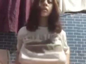 A seductive Malaysian college girl gives an oral and vaginal pleasure in a steamy session