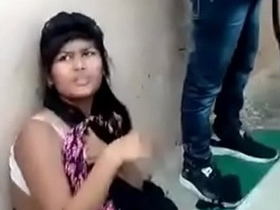 A young Indian woman with curly hair has her vagina touched and massaged by a teenage boy