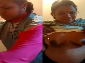 Tamil aunty's big boobs and naughty moves in ero day video