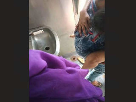 Train bathroom sex tape featuring a couple caught on camera by a passenger